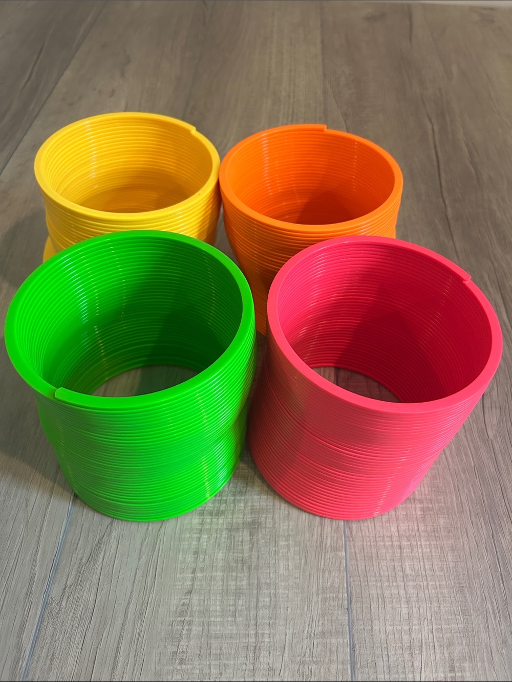 Bright Neon Giant Slinkies - Yellow, Orange, Green, Pink